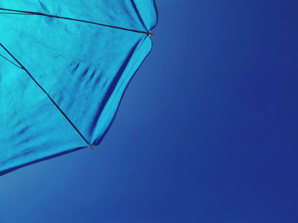 low-angle-view-beach-umbrella-ag