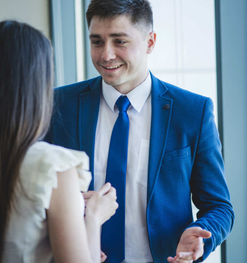 two-businesspersons-conversating